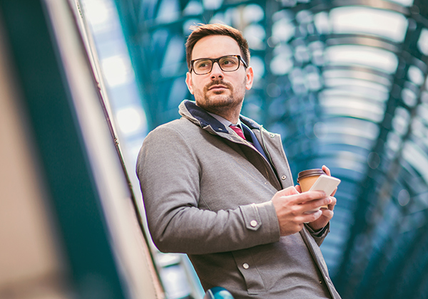 Man in mall watching someone casually